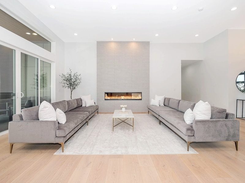 white couch and brown wooden table