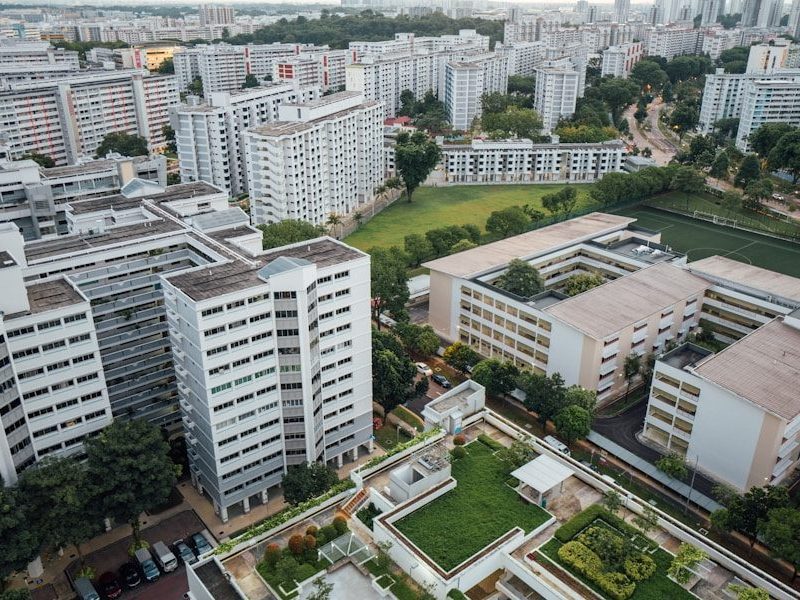 an aerial view of a city with lots of tall buildings