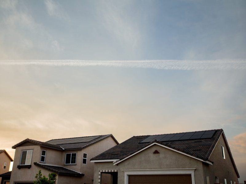 a house with a solar panel on the roof