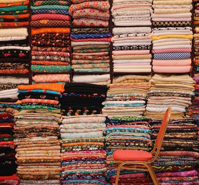 stack of books on red table
