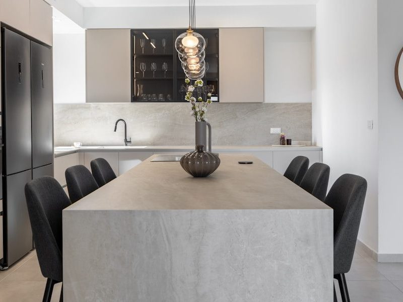 Modern kitchen with island and chairs