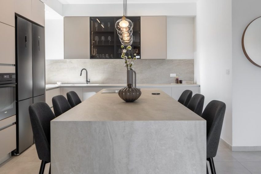 Modern kitchen with island and chairs