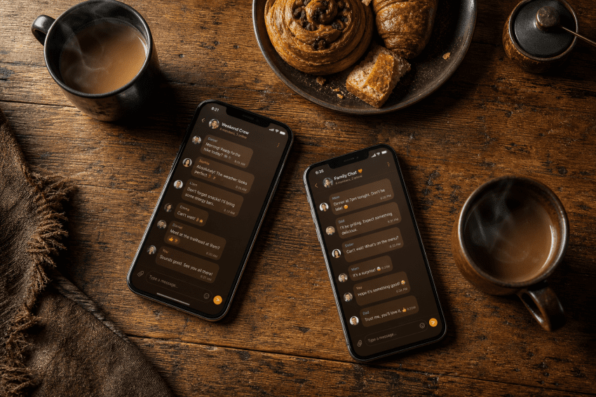 Phones displaying chat conversations beside coffee and pastries.