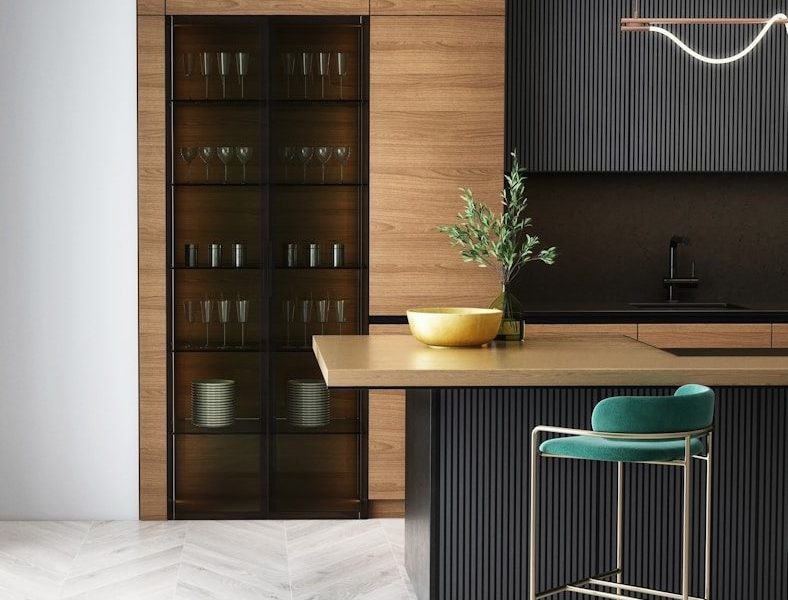 modern kitchen with wood cabinet teal stool