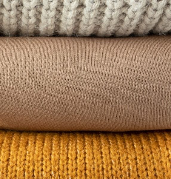 white and gray knit textile