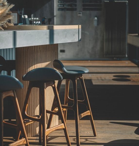 black and brown wooden bar stools