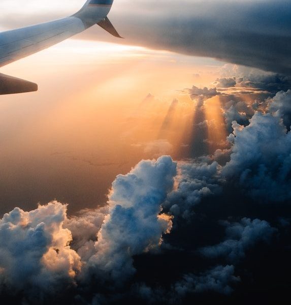 airplane on sky during golden hour
