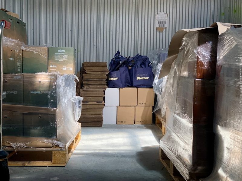 a warehouse filled with lots of boxes and bags