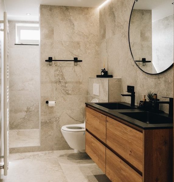 a bathroom with a large mirror